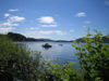 Lake Windermere with a boat and blue sky